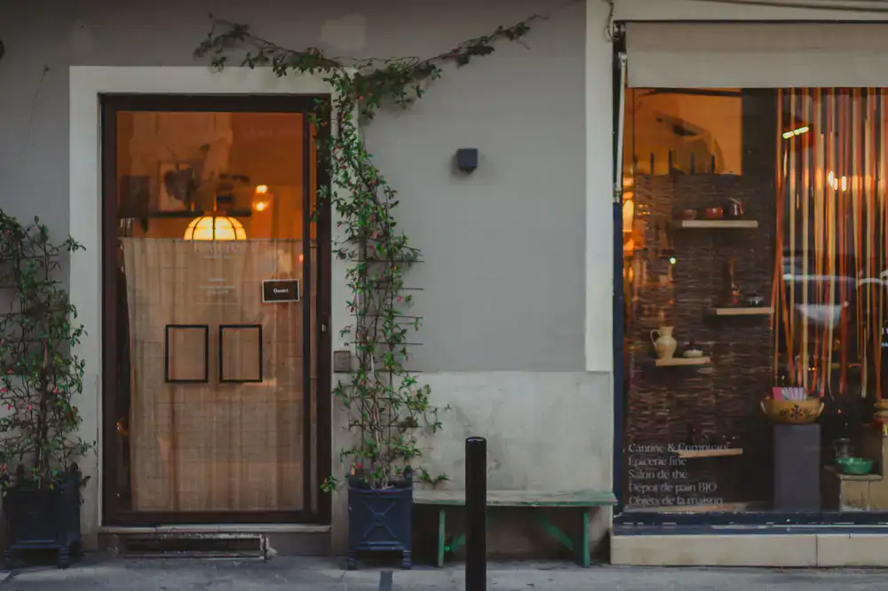 Warm, inviting storefront of the zero-waste shop with large windows